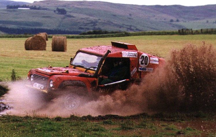 Land Rover in huge mud splash