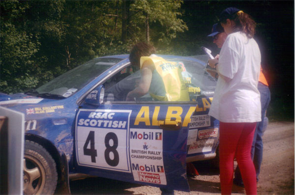 Marshals issue the competitor's stop time at the end of the stage.