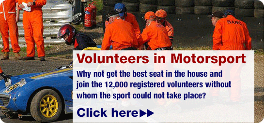 Image of marshals round a sports car, linked to the Volunteers In Motorsport site